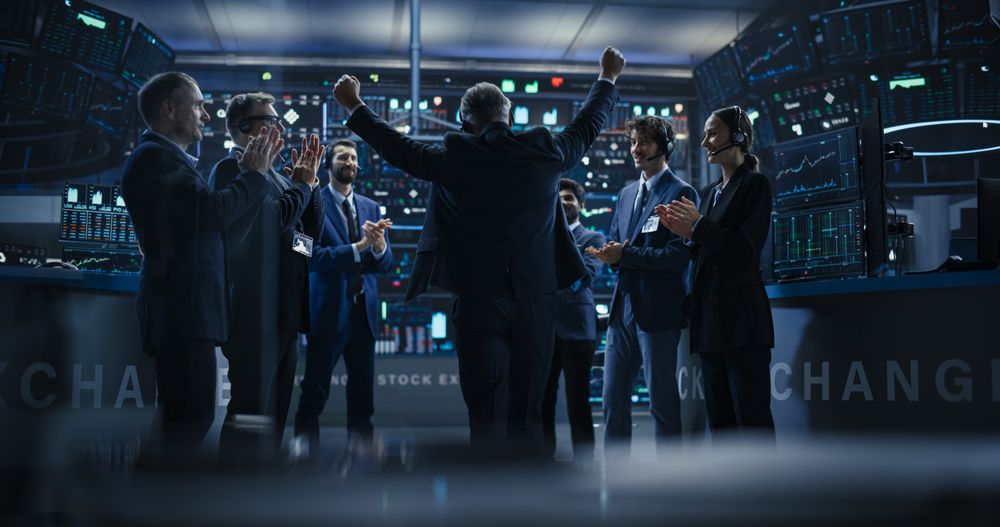 Team of Successful Stock Exchange Brokers Celebrating a Profitable Investment Bid on a Securities Market.