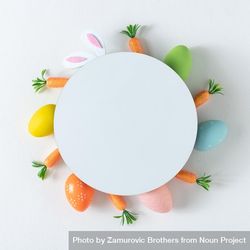 Easter circle of carrots and pastel eggs bYeYXb