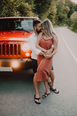 Loving couple dancing on road
