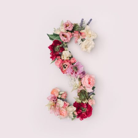 Letter S made of real natural flowers and leaves