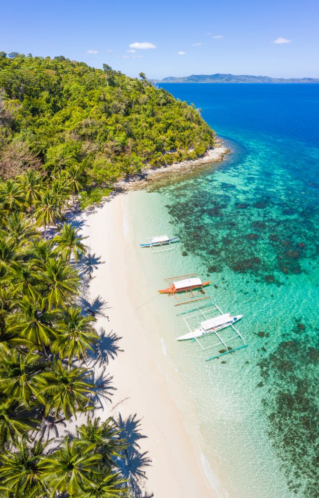 Aerial view of tropical island with blue water