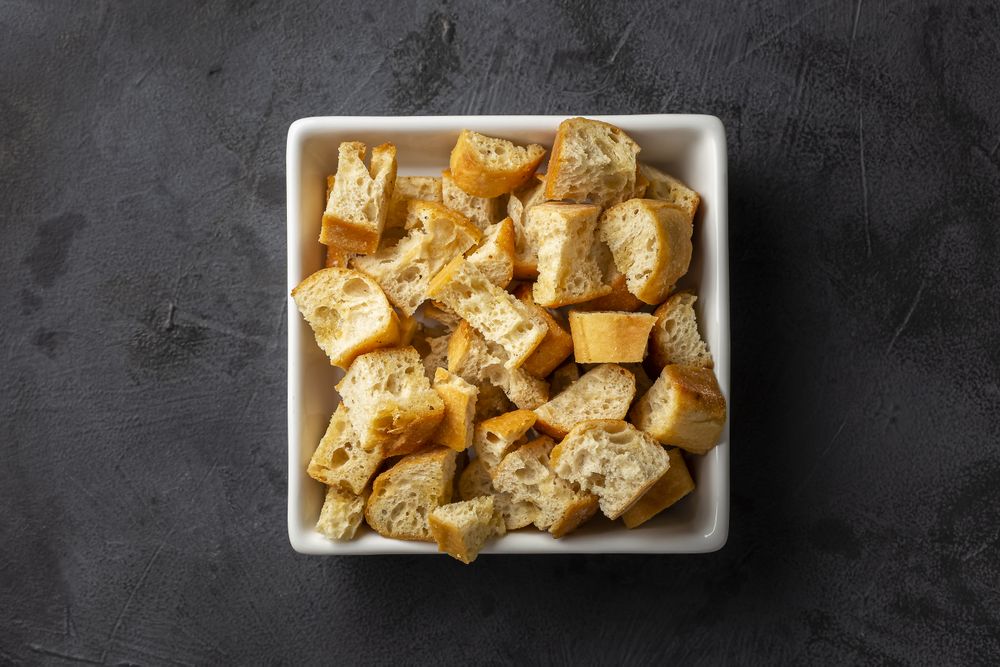 Delicious crunchy croutons on the table.