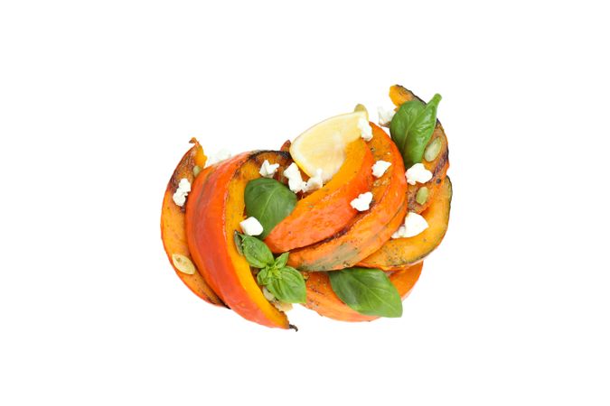 Baked pumpkin isolated on light background