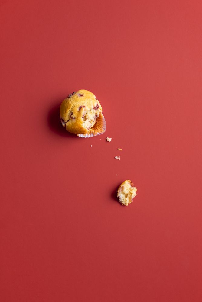 Strawberry muffin with a missing bite