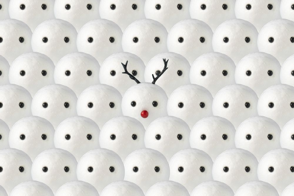 Snowmen pattern with one snowman with Christmas reindeer antlers