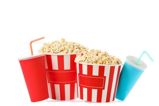 Popcorn buckets and paper cups isolated on plain background