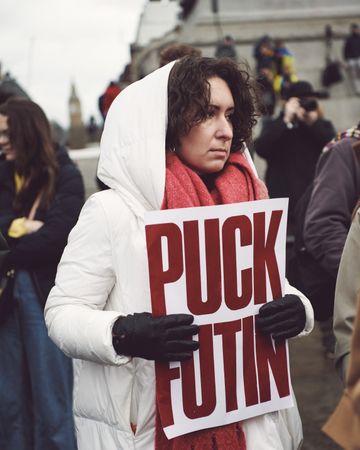 London, England, United Kingdom - March 5 2022: Woman with anti-Putin sign at protest in UK