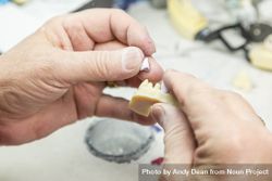 Dental Technician Working On 3D Printed Mold For Tooth Implants 56GnyV