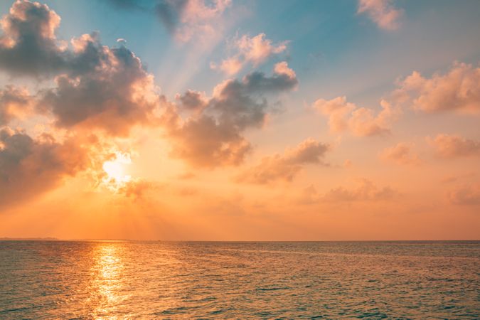 Peach tones in a sunset over the Indian Ocean, landscape