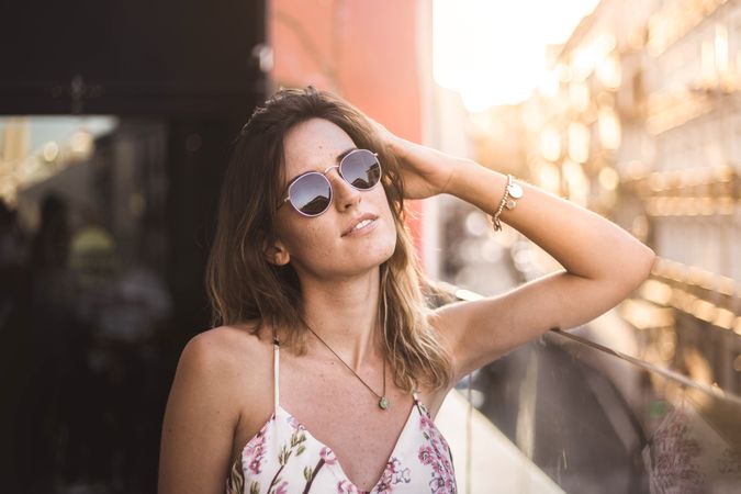 dreamy woman against sunny blurred background
