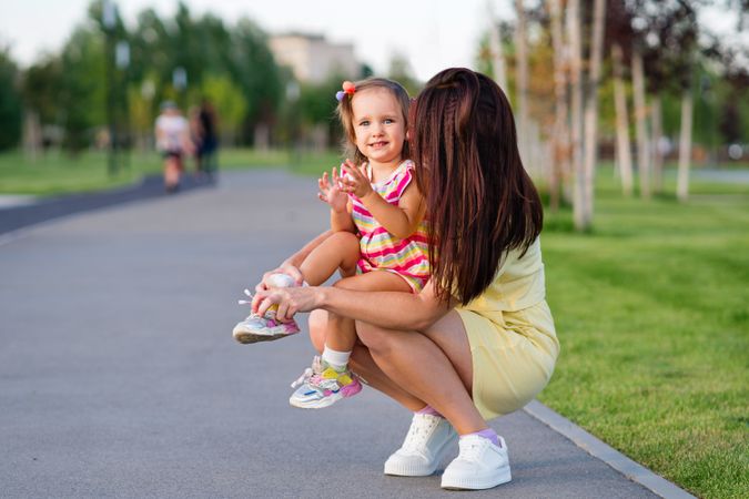 Toddler girl and mom on walk
