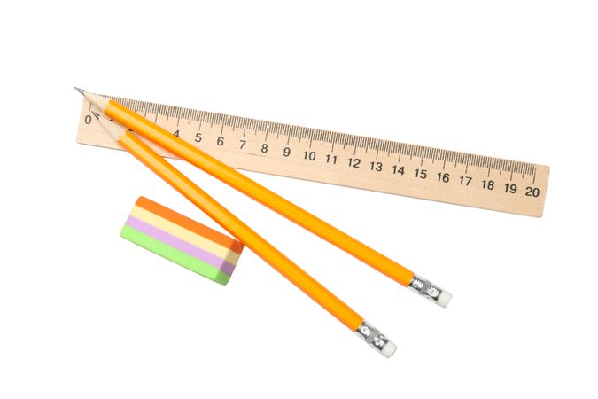 Freshly sharpened pencils with eraser on blank background