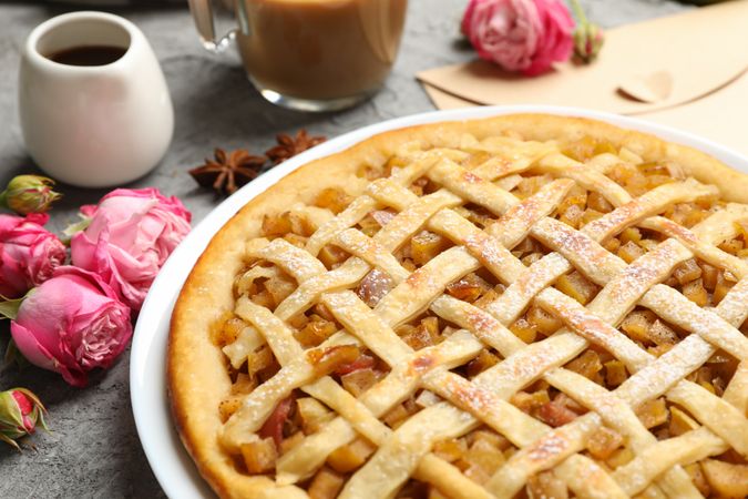 Composition with apple pie on gray background. Homemade food