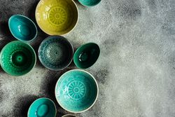 Empty bowls on stone background