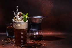 Iced coffee latte in tall glass