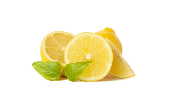 Fresh lemons isolated on light background. Ripe fruit