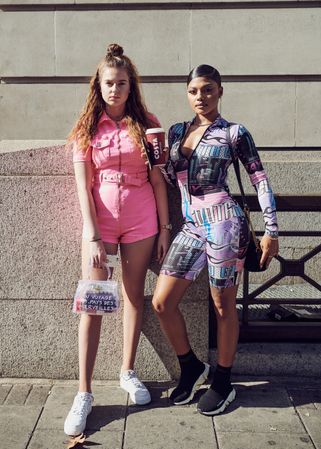 London, England, United Kingdom - September 15th, 2019: Two woman in streetwear standing outside