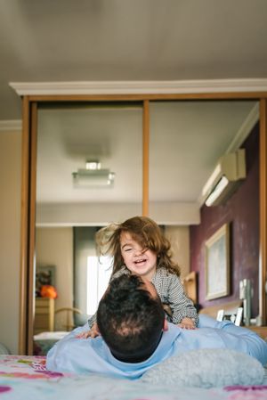Father playing with daughter