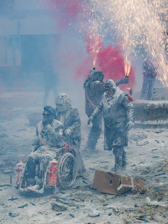 Ibi, Spain - December, 28 2018: People celebrating victory in flour and eggs battle