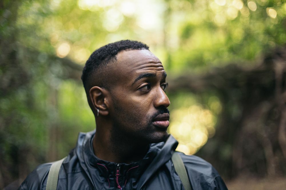 Man looking away in the jungle