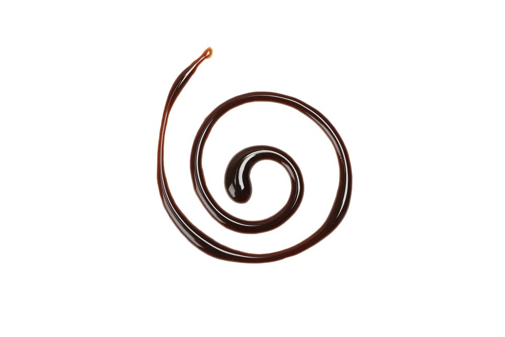 Tasty melted chocolate isolated on blank background