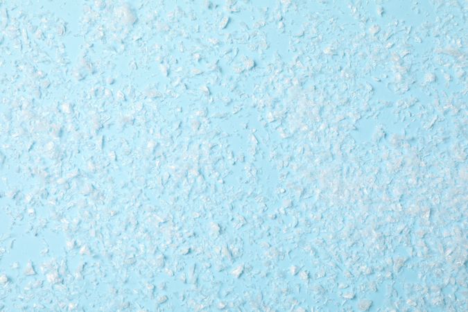 Fluffy snow on blue background, empty space for text