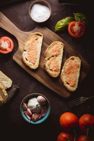 Spices and vegetables near toasts