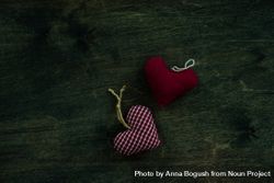 Valentine's day concept of thatched heart decorations on wooden table with copy space 49mmBE