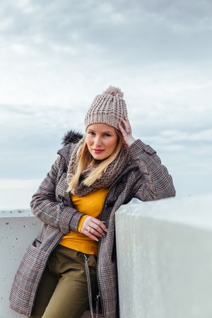 Portrait of blonde woman posing in the city