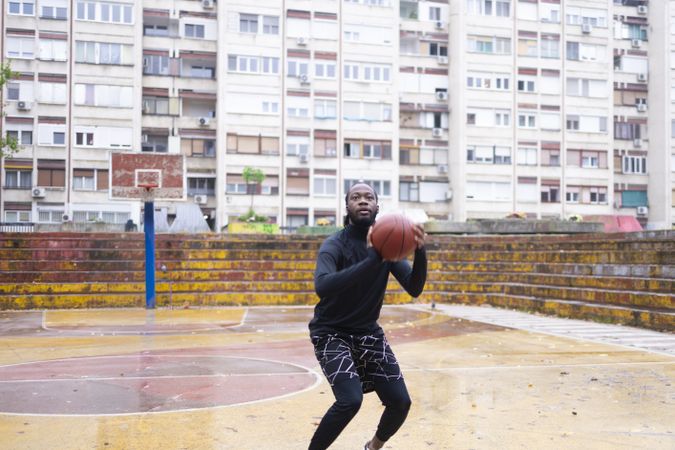 Young Black Man Playing Basketball.