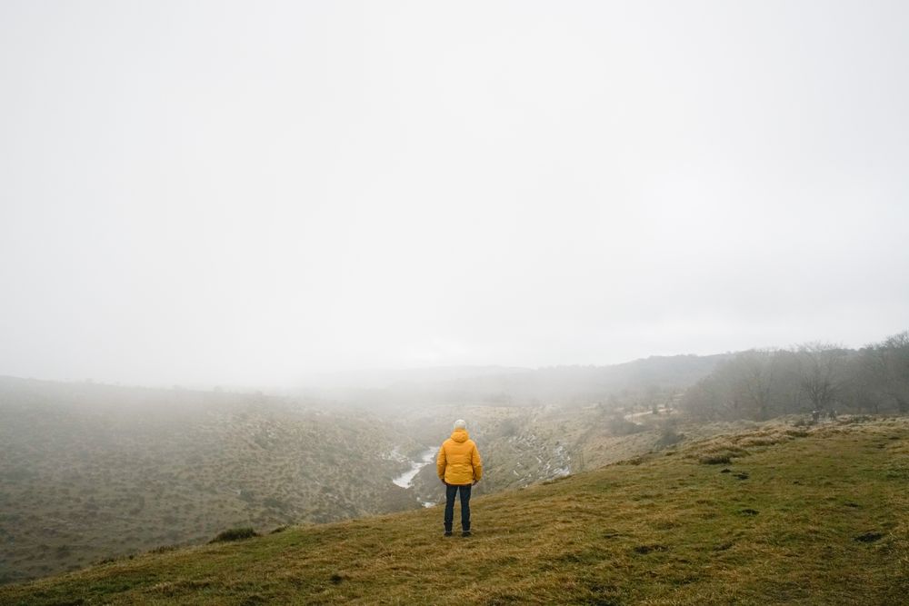 Man standing on hill