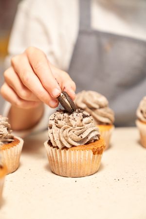 Cupcake decorated with cookie by crop chef