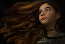 Girl with makeup looking away