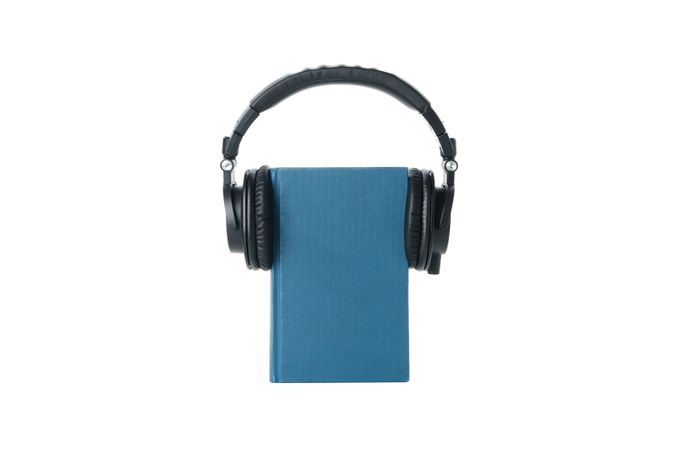 Concept of audiobook, isolated on light background