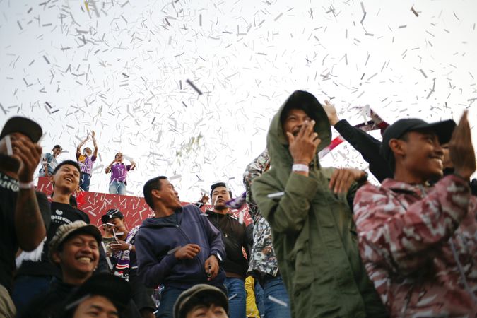 Kedira, East Java Indonesia - October 4, 2019: Jubilant soccer fans celebrating goals