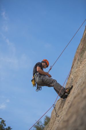 Man climbing a rock