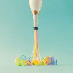 Champagne bottle with party streamers