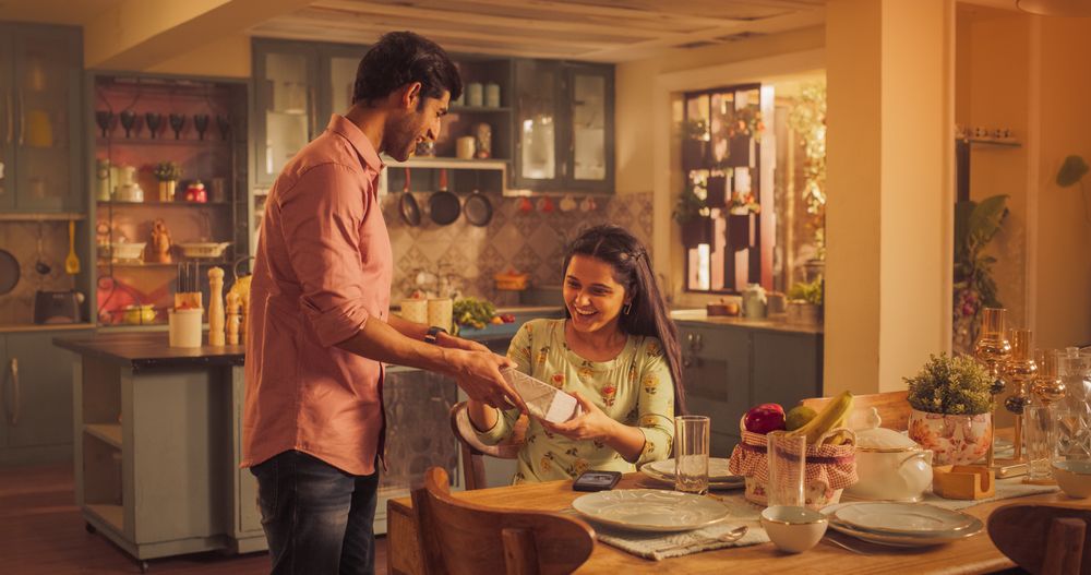 Surprise Romantic Present: Affectionate Indian Boyfriend Gives a Gift to His Beloved Girlfriend.