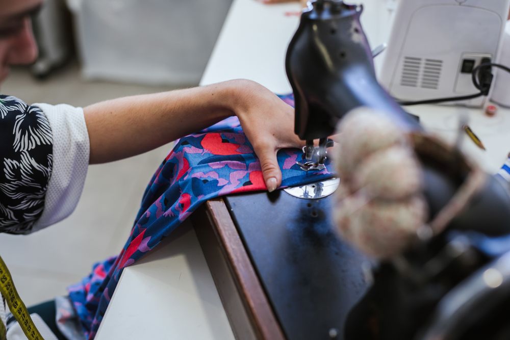 Woman in a sewing school
