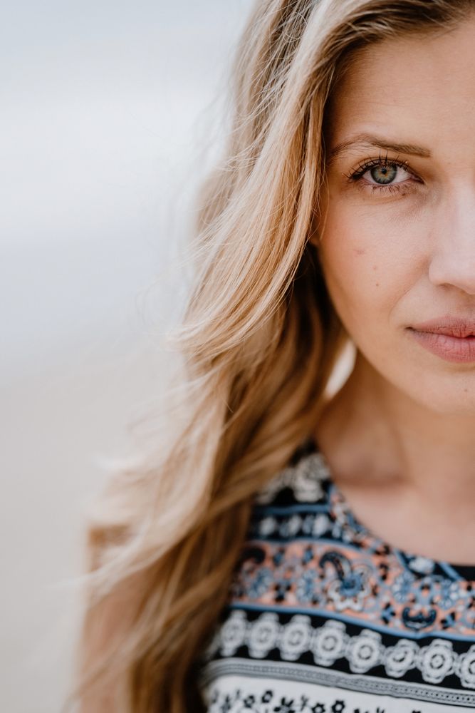 Crop of half face of young woman