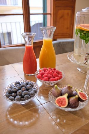 Assorted berries and drinks in boardroom