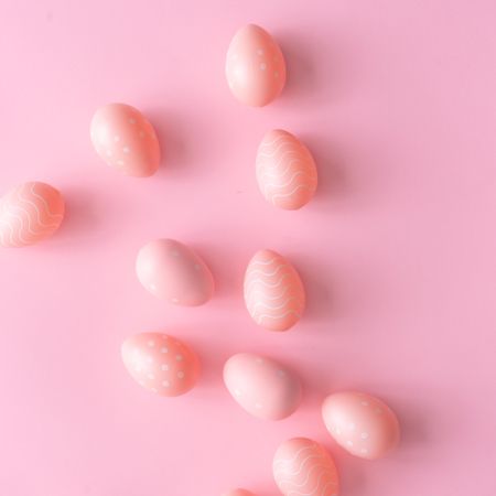 Pink Easter eggs on pink table
