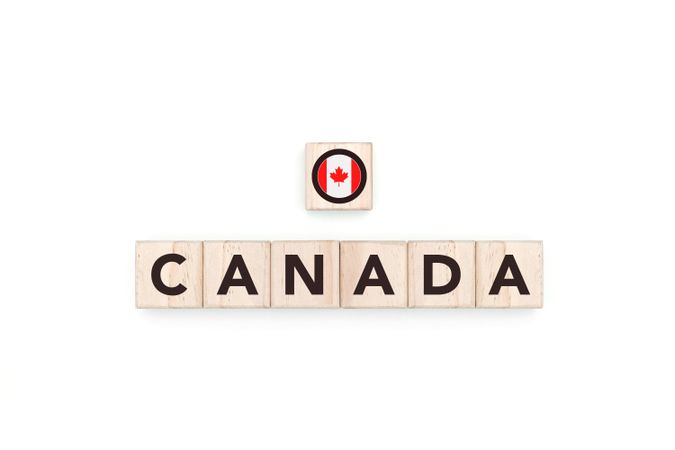 Wooden blocks bearing the name and flag of Canada.