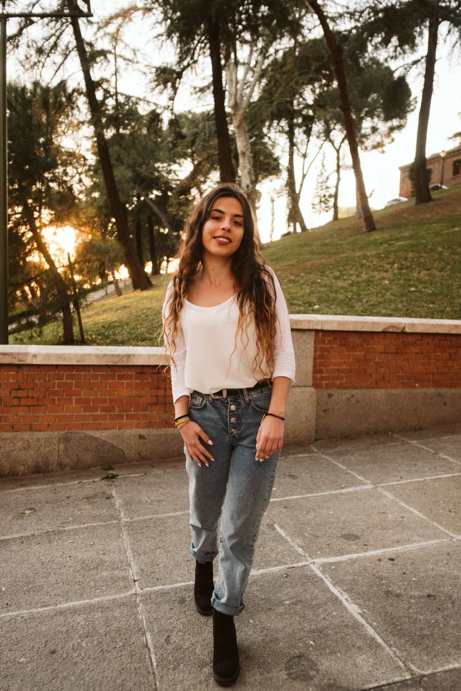 Cheerful young woman in street