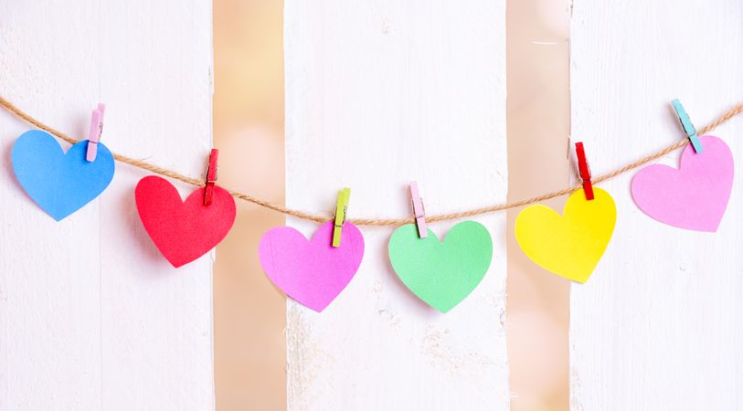 Multicolored hearts tied on a string