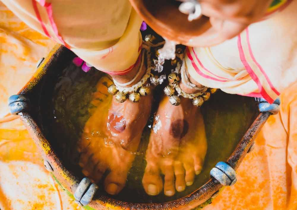 Man's feet in water