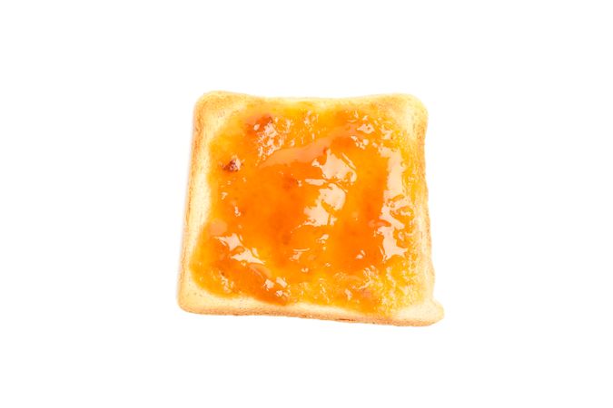 Toast with apricot jam isolated on plain background
