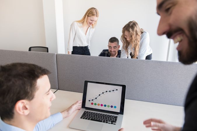 Group of colleagues working in contemporary office