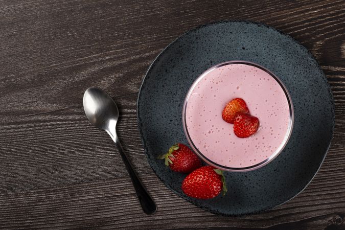 Delicious strawberry mousse in glass goblet.
