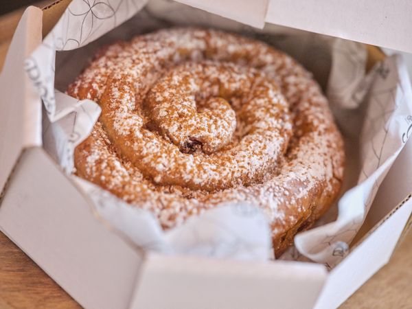 Tasty pastry in carton box